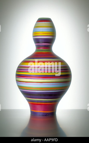 Multicoloured, striped glass vase Stock Photo