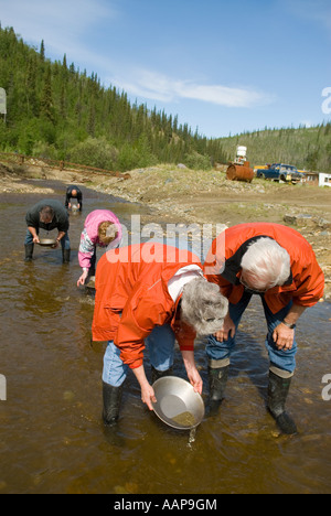 Panning for gold on a creek near Dawson City Yukon Canada Stock Photo