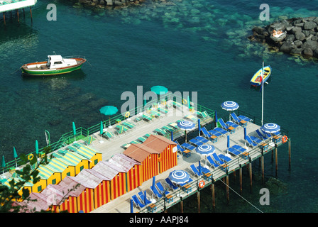 Sorrento coastal resort looking down on waterside sunbathing facilities before the daily influx of sun worshipers arrive Stock Photo