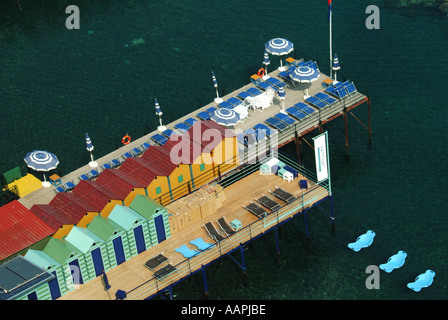 Sorrento coastal resort looking down on waterside sunbathing facilities before the daily influx of sun worshipers arrive at Bay of Naples Italy Stock Photo