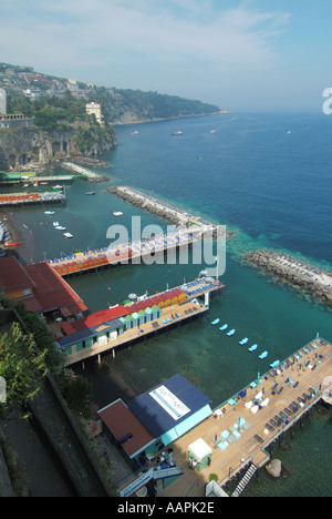 Sorrento resort view down on sunbathing facilities before the daily influx of sun worshipers arrive with view of Bay of Naples Stock Photo