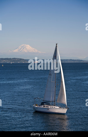 Sailboat on Puget Sound with Mount Rainier in the distance Seattle Washington Stock Photo