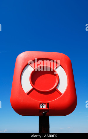 Life Buoy on the seafront of Westward Ho! in Devon, England. Stock Photo