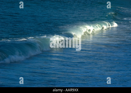Wave breaking in Waimea Bay Beach Park North shore Oahu Hawaii USA Stock Photo