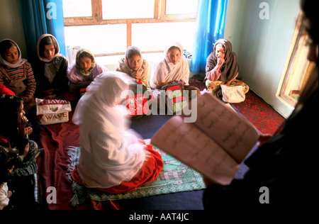 REBIRTH OF A NATION DESPITE TALIBAN BAN ON EDUCATION FOR WOMEN THIS PRIVATE SCHOOL HAS BEEN RUN FOR 2 YEARS SECRETLY 2001 Stock Photo