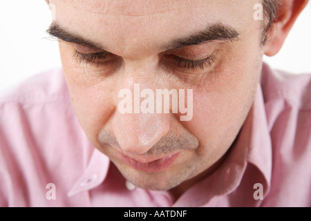 Middle aged man looking sad Stock Photo