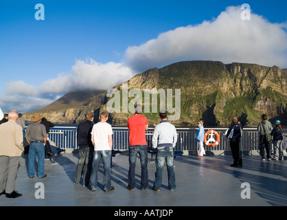 dh Kame of Hoy HOY ORKNEY Passengers on board MV Hamnavoe car ferry looking at seacliffs Stock Photo