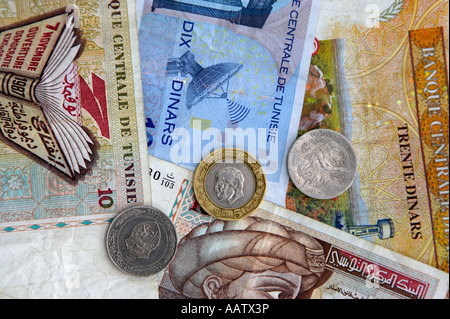 tunisian dinars bank notes and coins 10 and 30 dinar notes 1 and 5 dinar coins Stock Photo