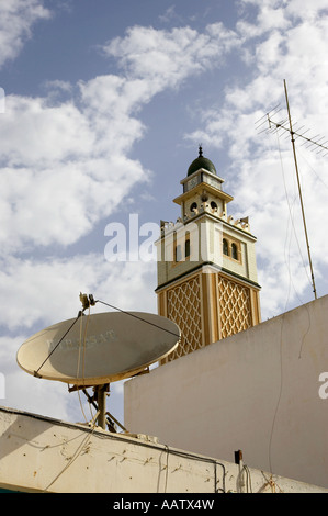 minaret tower of the mosque in nabeul tunisia with satellite and antenna aerials Stock Photo