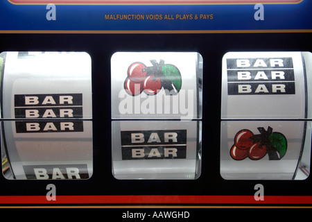 Close-up of the symbols on the wheels of a slot machine. Stock Photo
