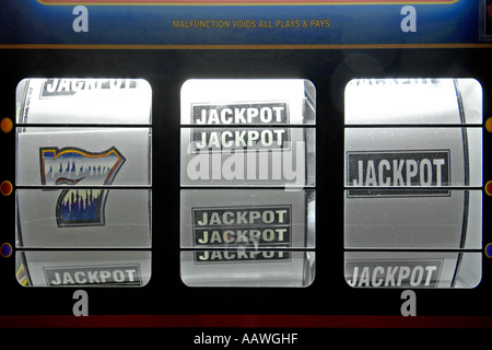 Close-up of the symbols on the wheels of a slot machine. Stock Photo