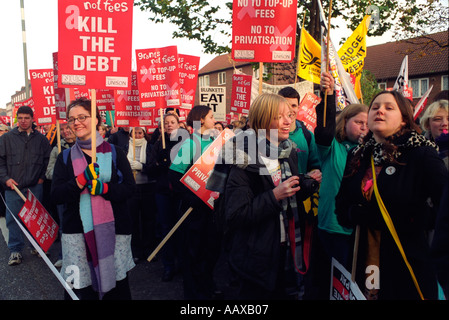 Student protest march through London demonstrating against government policy of privatisation and student fees Stock Photo