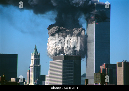 WTC (world trade center) 2 collapsing as WTC 1 still stands behind it in NYC on September 11th, 2001. Stock Photo