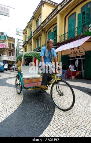 A rickshaw taxi in central Macau at Largo do Senado China 2006 Stock Photo