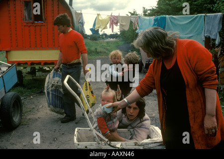 Gypsy camp family West Coast Southern Ireland Eire. Young mother and baby father grandmother, three generations.1970s 70s HOMER SYKES Stock Photo