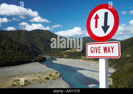 Motu river gorge and bridge east cape with give way sign on narrow road Stock Photo