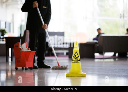 floor cleaning in hotel foyer Stock Photo