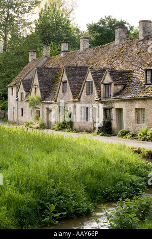 Early morning light falling on Arlington Row in the Cotswold village of Bibury, Gloucestershire Stock Photo