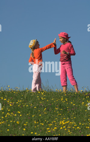 girl child sisters playing together Stock Photo
