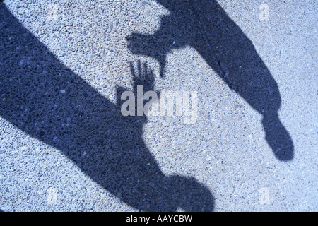 Shadow of businesspeople handshake Stock Photo