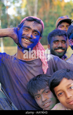 Young men celebrates Holi Festival at the Benegenaatti Sattra on the river island of Majuli, Assam. Stock Photo