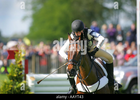 Champion Pippa Funnell rides Primmore s Pride through the lake at Badminton Horse Trails May 2005 Stock Photo