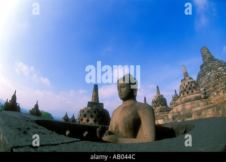 Stone Buddha at the Borobudur Buddhist complex on the island of Java in Indonesia Southeast Asia Stock Photo