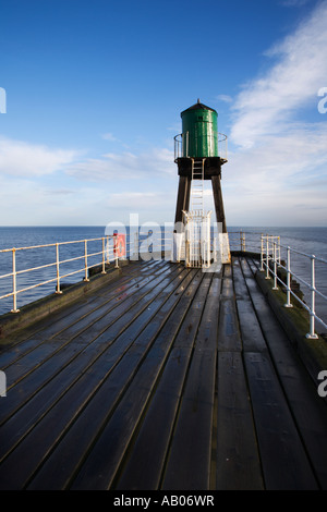Boardwalk on the breakwater at the end of the West Pier in Whitby in the early morning North Yorkshire England Stock Photo