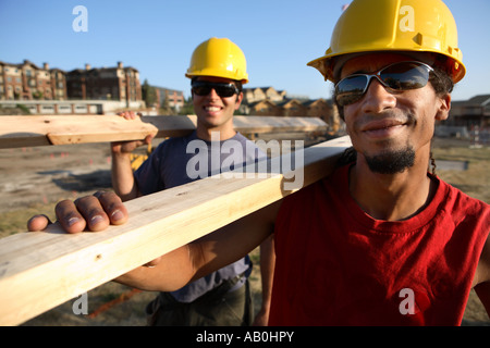 Two construction workers smiling portrait Stock Photo