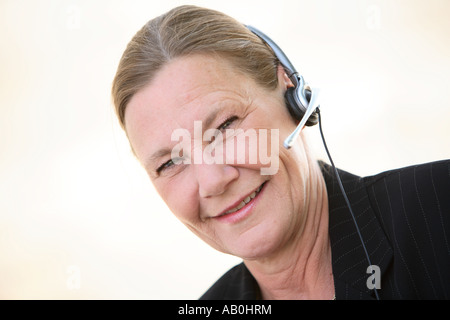Businesswoman with headset Stock Photo