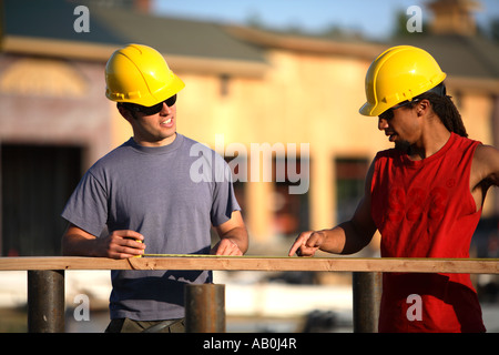 Construction workers working together Stock Photo