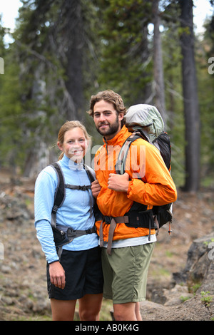 Portrait of couple backpacking Stock Photo