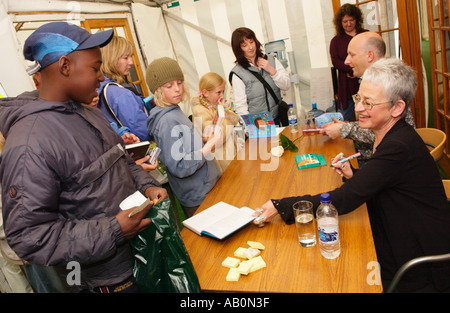 Fans of childrens author Jacqueline Wilson queue for her to sign books at The Guardian Hay Festival 2005 Stock Photo