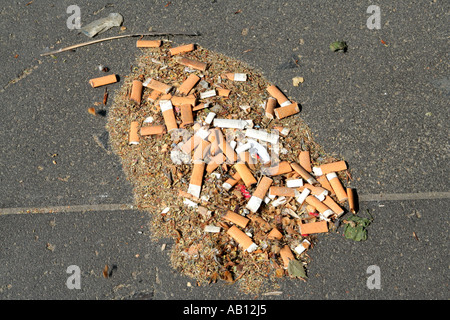 Cigarette butts on the ground Stock Photo