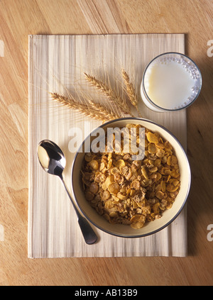 Breakfast setting with cereal milk spoon napkin and wheat Stock Photo