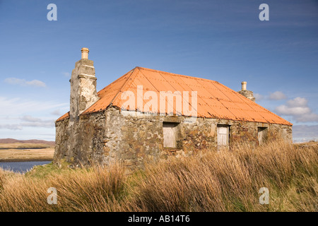 UK Scotland Western Isles Outer Hebrides North Uist Lochmaddy abandoned tin roofed croft Stock Photo