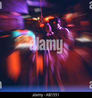 couple dancing at disco abstract Stock Photo