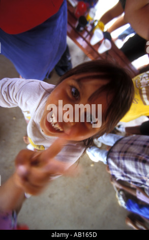 Aboriginal child with face paint blue yellow 1447 Stock Photo - Alamy