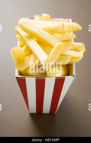 Chips in striped box FoodCollection Stock Photo