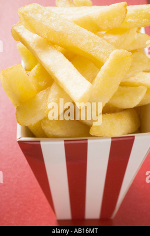 Chips in striped box FoodCollection Stock Photo