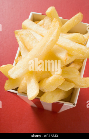 Chips in striped box FoodCollection Stock Photo