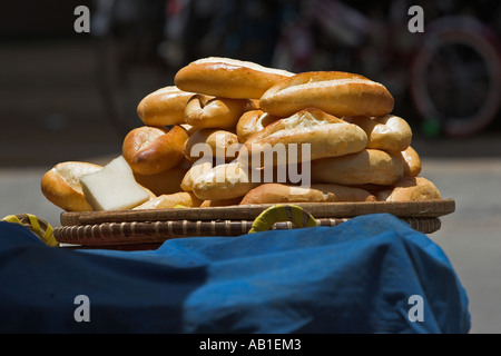 Crusty French style fresh bread roll display at roadside stand Phan Thiet south east Vietnam Stock Photo