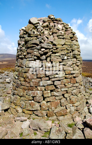 Garn Wen cairn in the Black Mountains next to footpath on ridge opposite Llanthony Priory Monmouthshire South East Wales UK Stock Photo