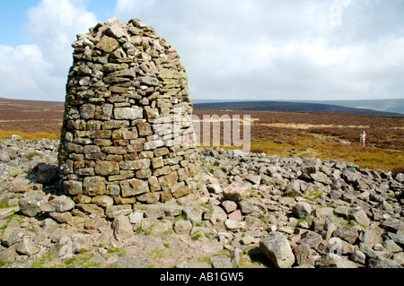 Garn Wen cairn in the Black Mountains next to footpath on ridge opposite Llanthony Priory Monmouthshire South East Wales UK Stock Photo