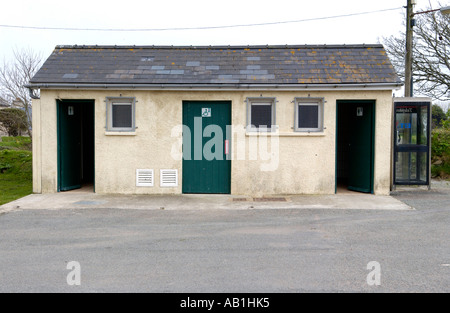 Public toilet with BT phone box in village of Marloes Pembrokeshire West Wales UK Stock Photo