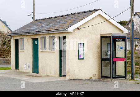 Public toilet with BT phone box in village of Marloes Pembrokeshire West Wales UK Stock Photo