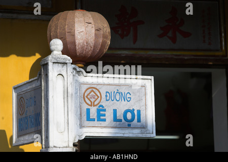 Duong Le Loi sign main shopping and restaurant street named after medieval emperor Hoi An historic town mid Vietnam Stock Photo