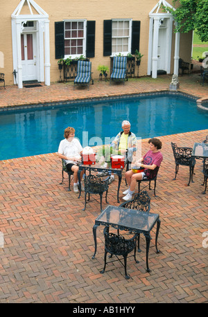 Sitting by pool Cedar Grove Vicksburg Mississippi USA Stock Photo