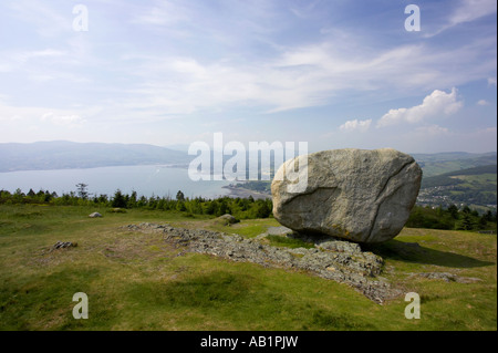 The cloughmore stone looking down on Carlingford Lough Stock Photo