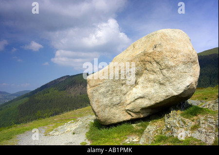 Side view of the The cloughmore stone on Slieve Martin lit by sunlight Rostrevor Stock Photo